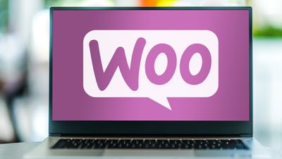 Laptop computer displaying logo of WooCommerce