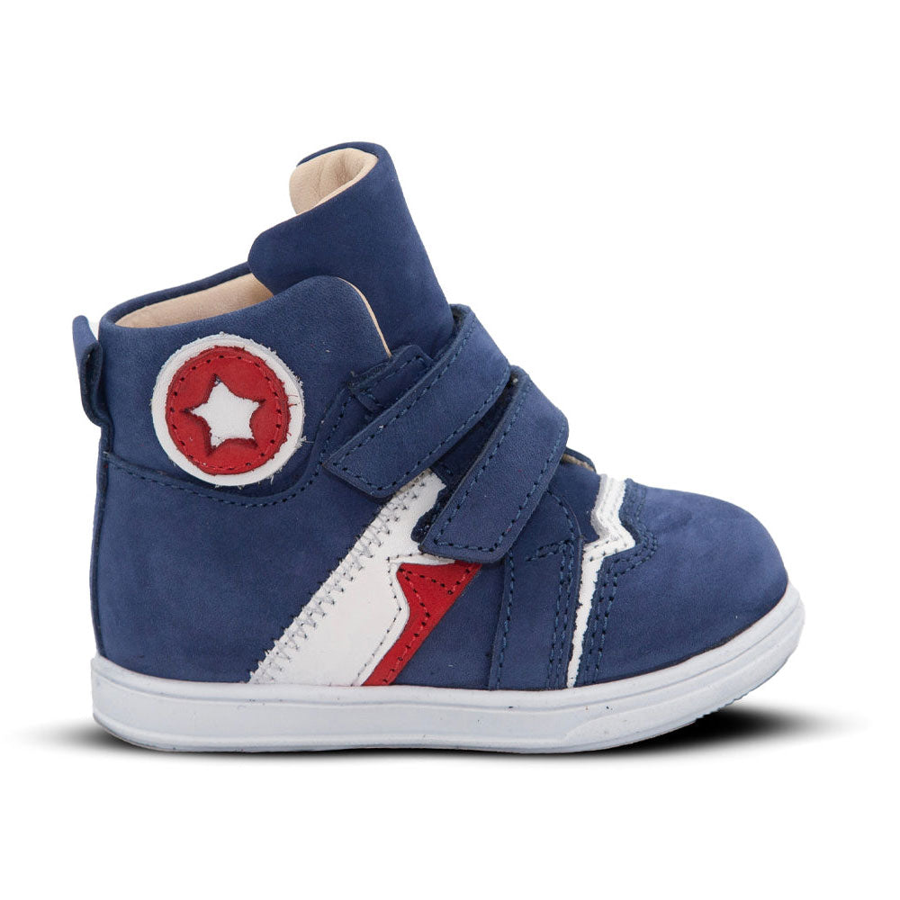 a blue sneaker with a red and white star on the side