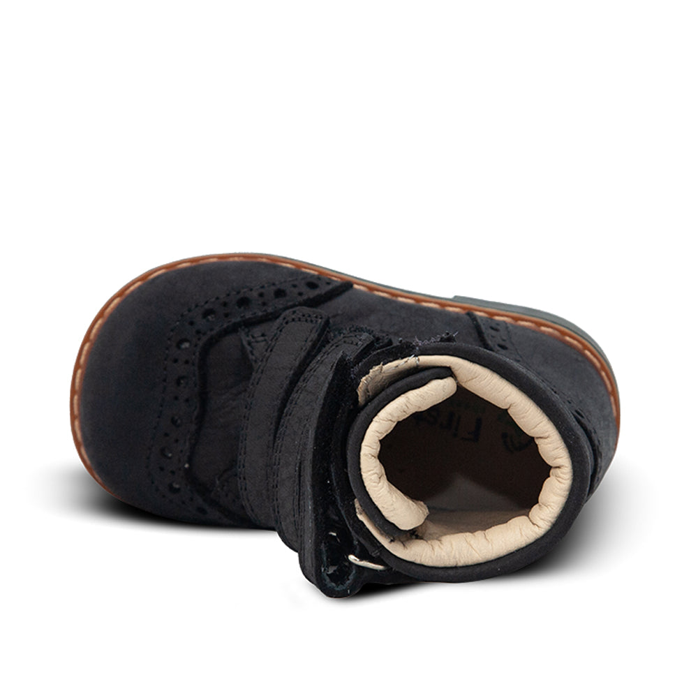 a close up of a child's shoe on a white background