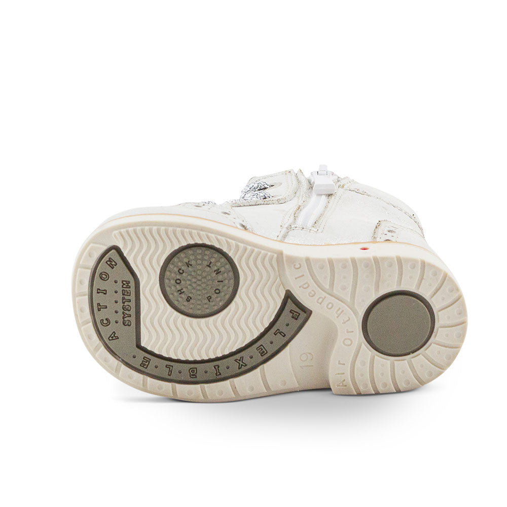 a close up of a white shoe on a white background