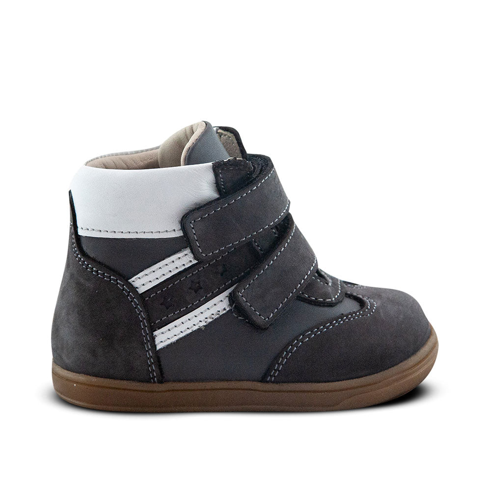 a close up of a child's shoe on a white background