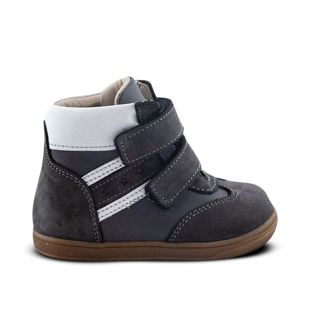 a close up of a child's shoe on a white background