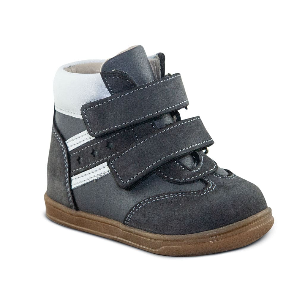 a child's shoe with two straps on the side