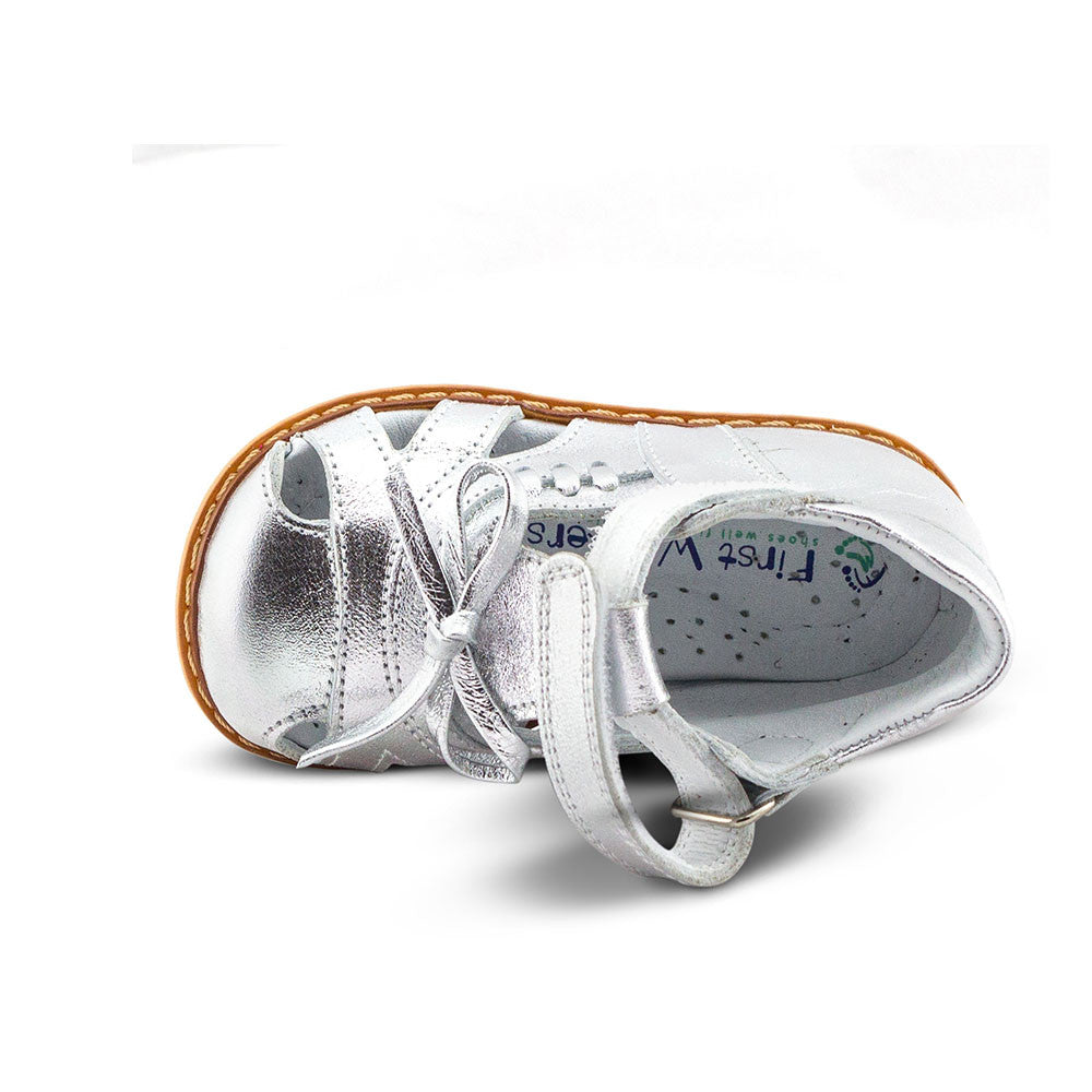 a close up of a child's shoe on a white background