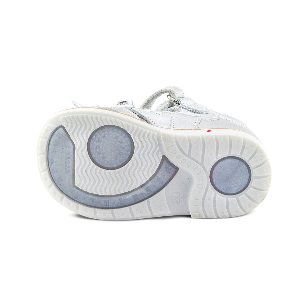 a close up of a white shoe on a white background