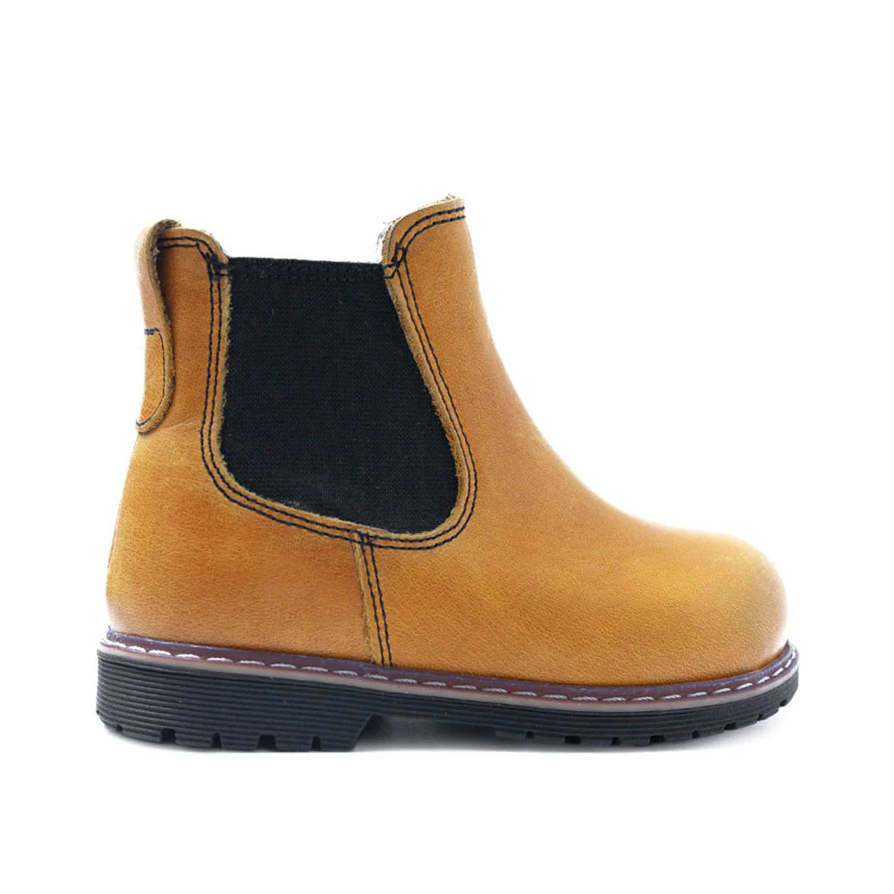 a pair of yellow boots with a black sole