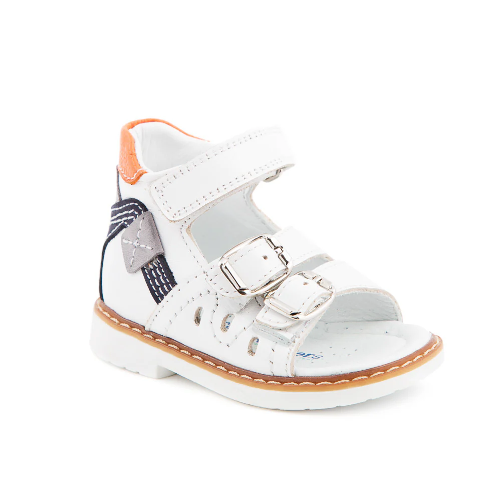 a white shoe with a buckle on the side