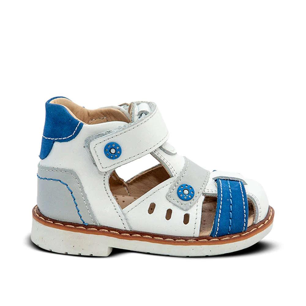 a little boy's white and blue sandals