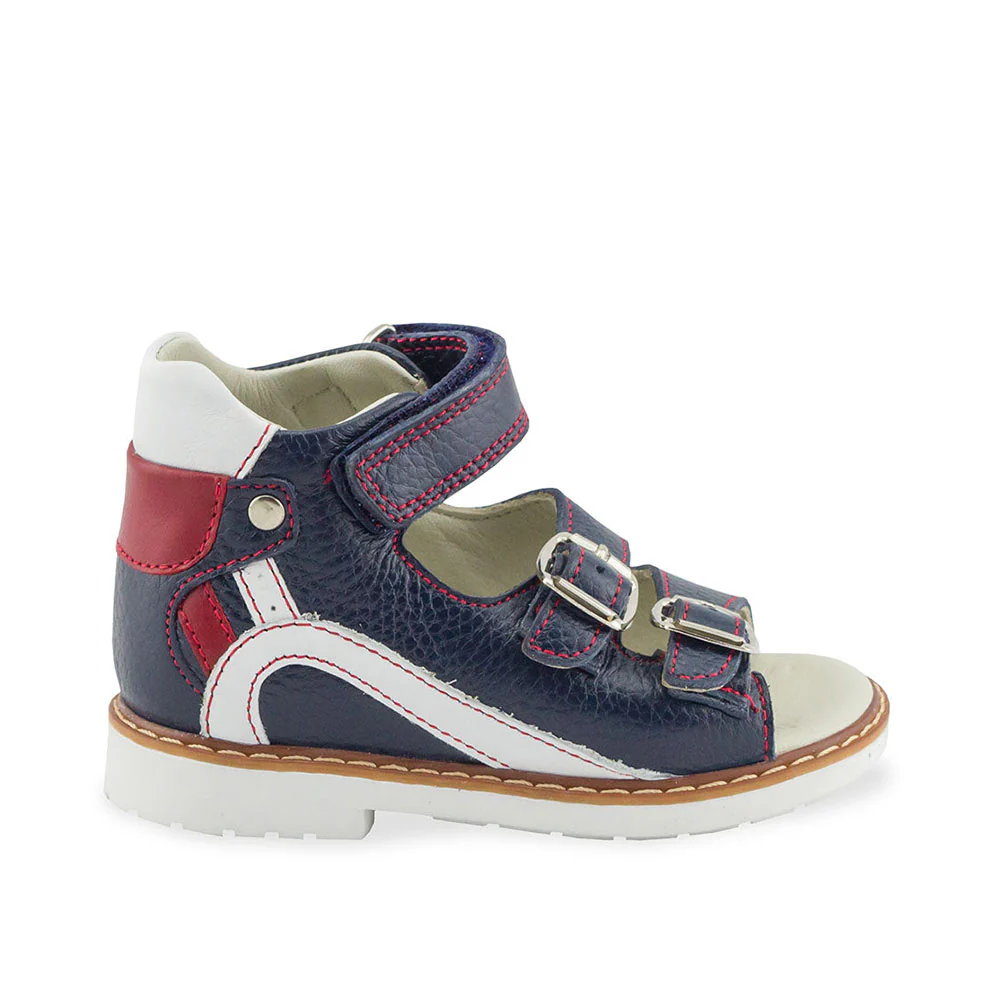 a child's shoe with a red, white, and blue color scheme