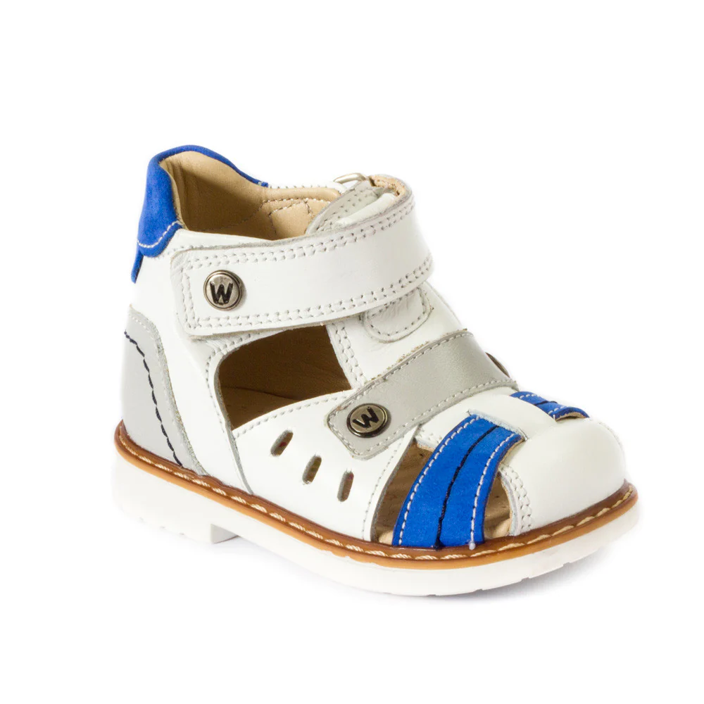 a little boy's white and blue sandals