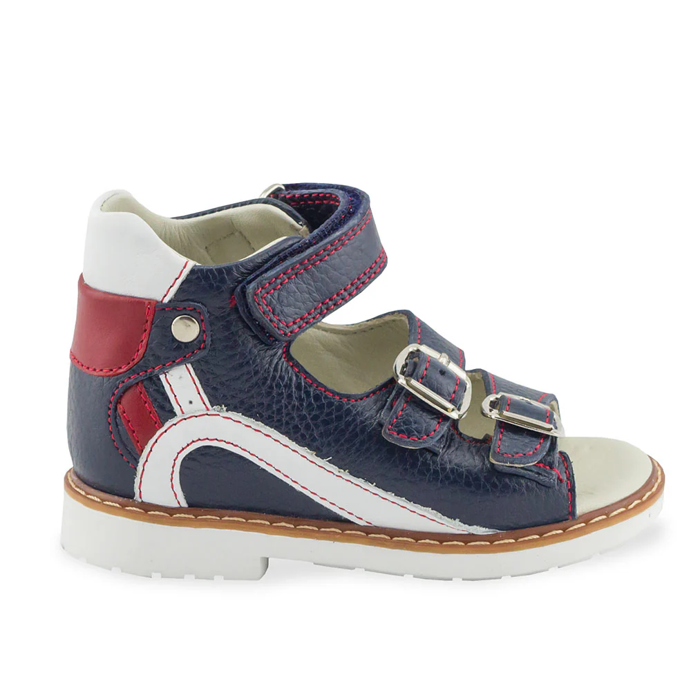 a child's shoe with a red, white, and blue color scheme