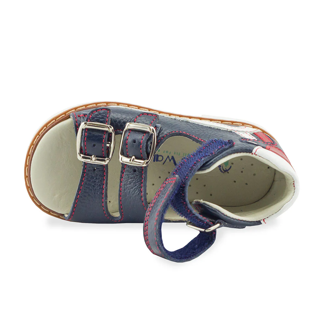 a child's shoe with two straps