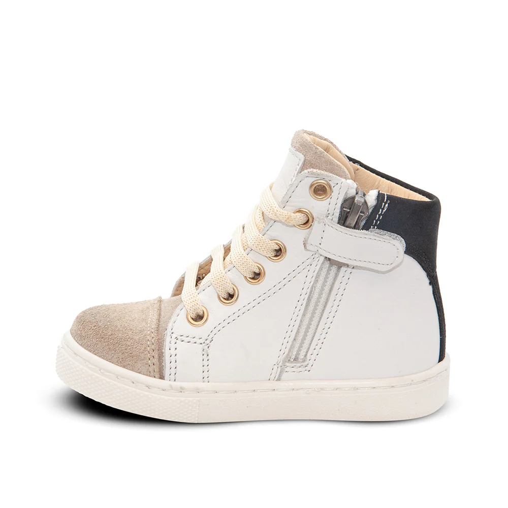 a child's white and black high top sneaker