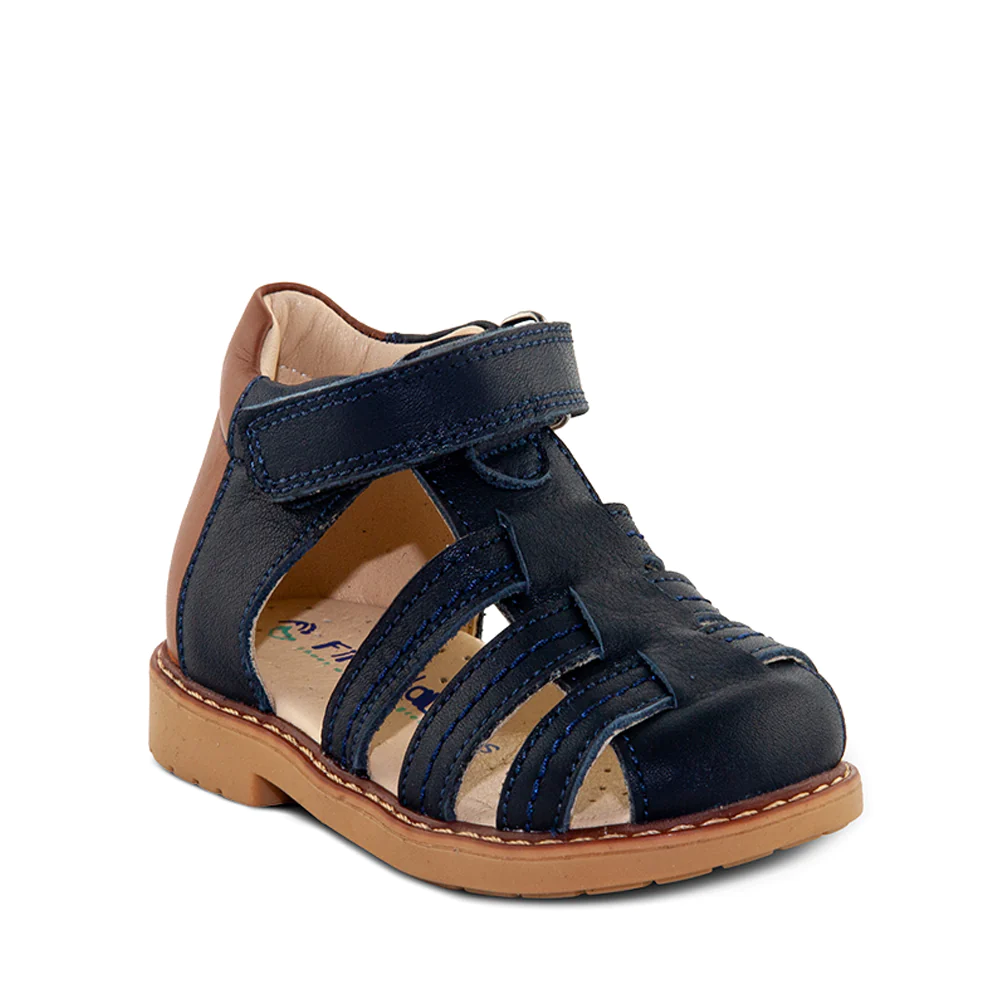 A child's sandal with straps and a closed toe