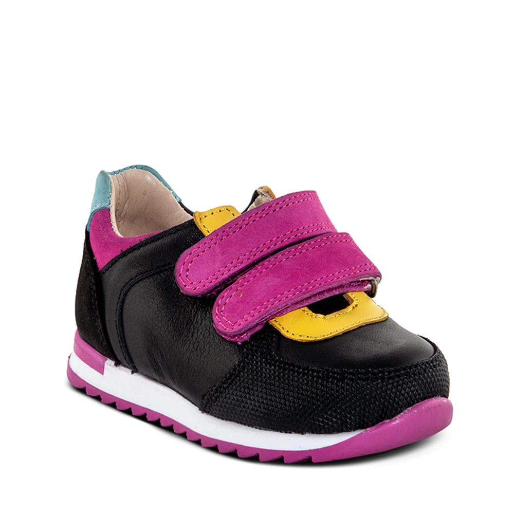 A child's black and yellow sneaker with pink straps