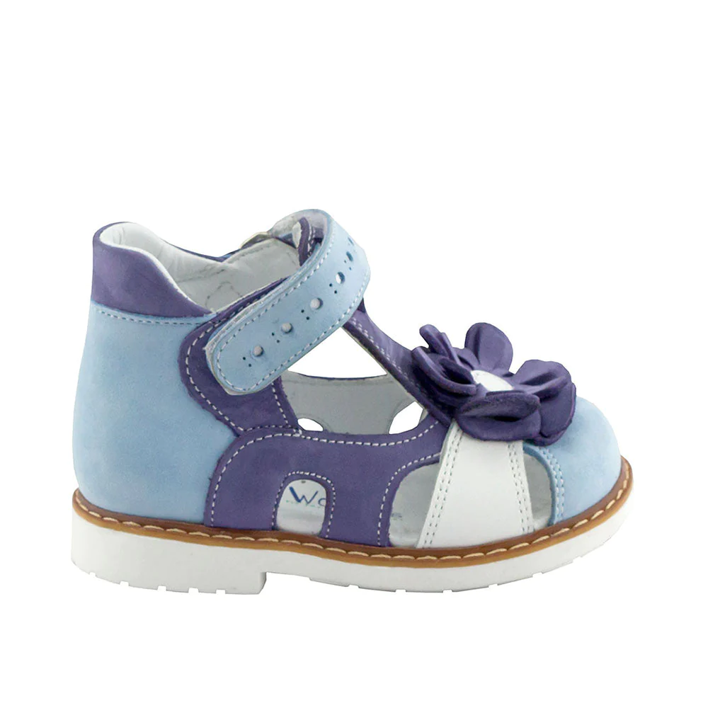 a child's blue and white shoe with a bow