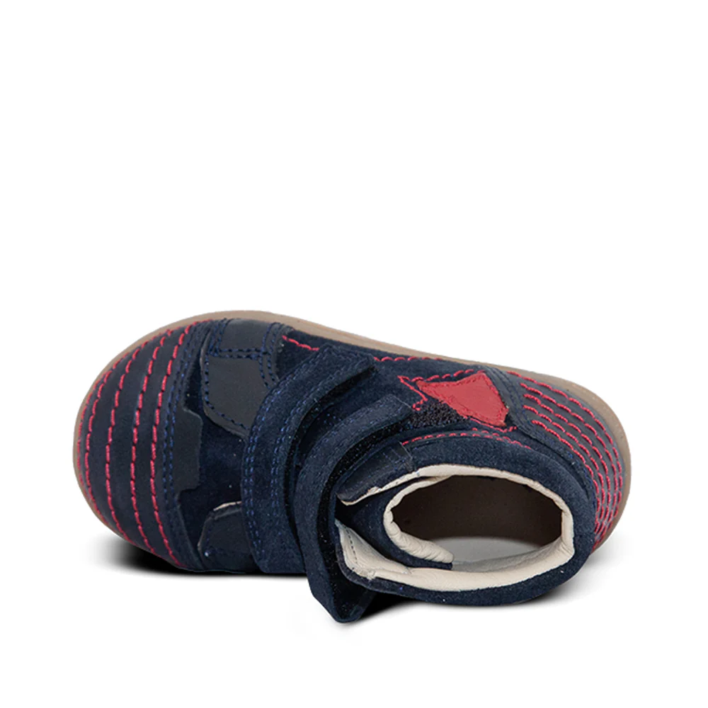 a close up of a child's shoe on a white background