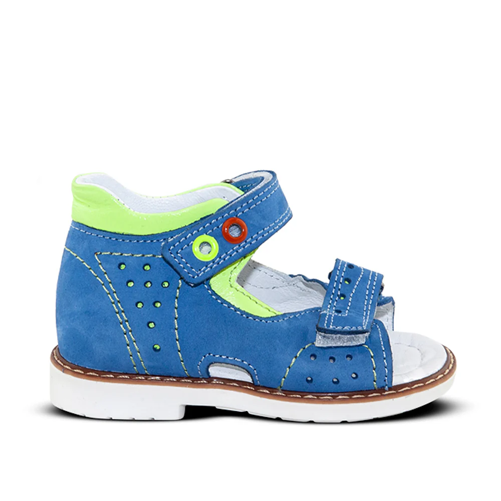 a child's blue shoe with green and white trim