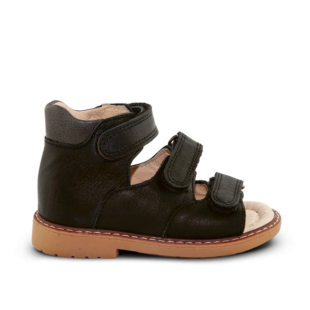 a child's black leather sandal with two straps