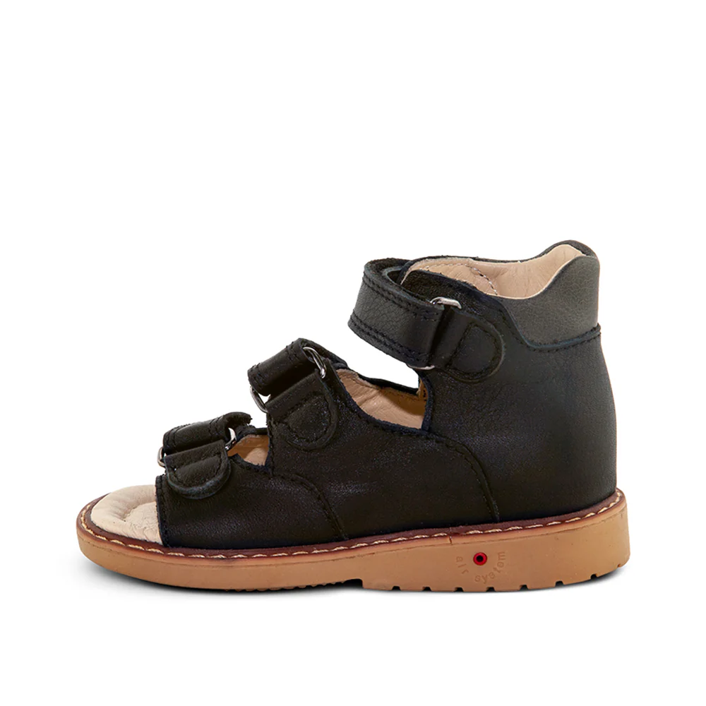 a child's black leather sandal with two straps