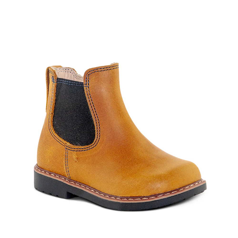 a child's yellow boot with a black sole