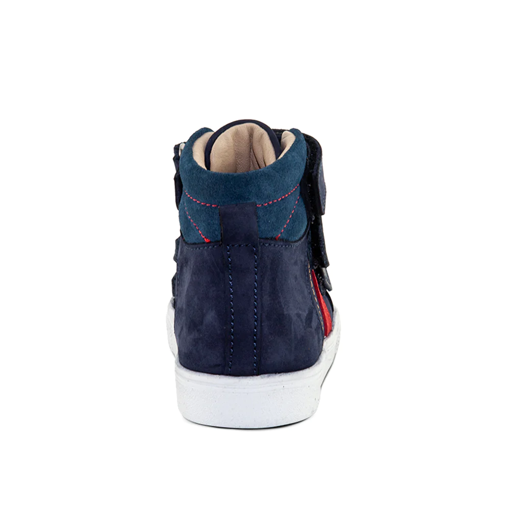 A child's red and blue sneaker with a white sole