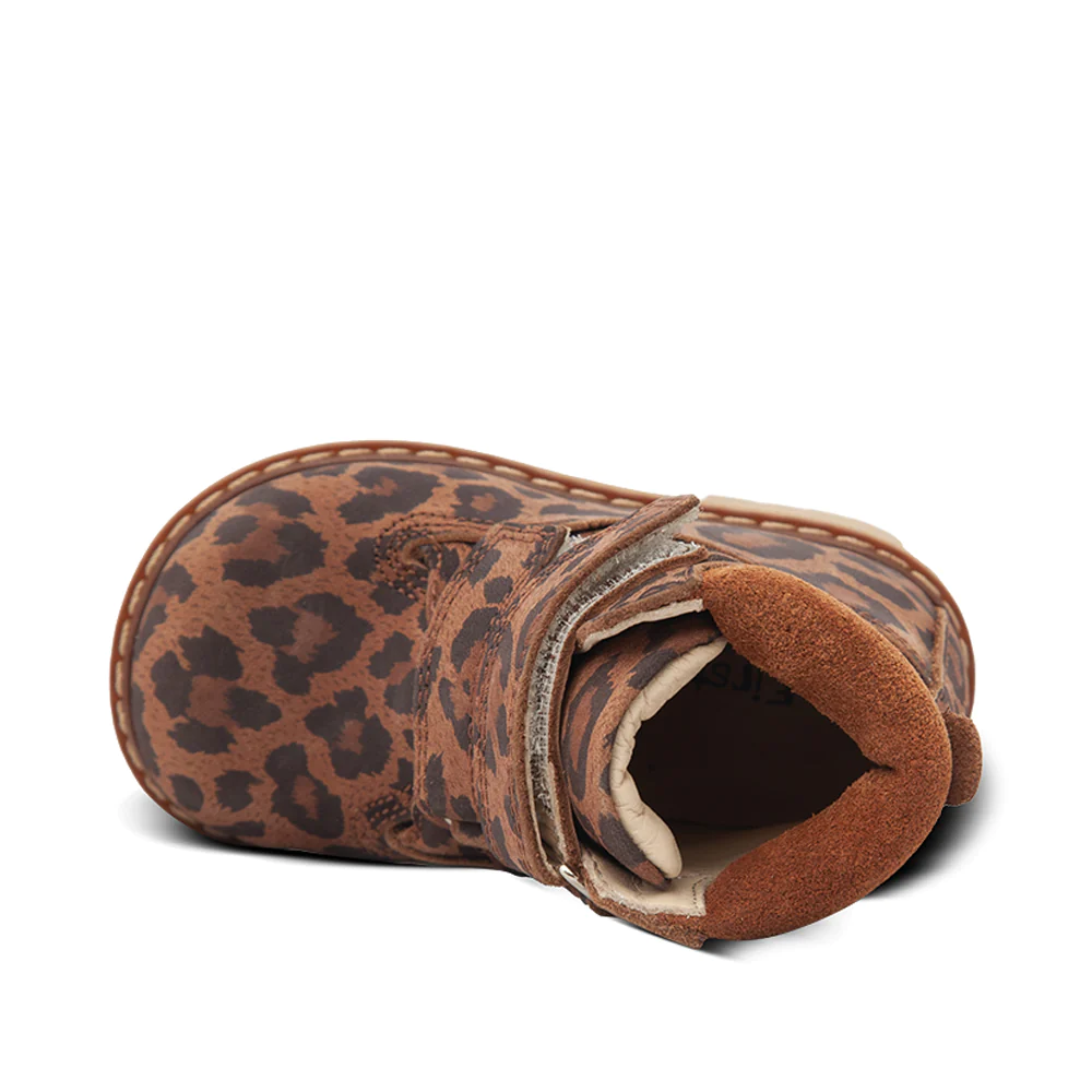 a close up of a boot with a leopard print