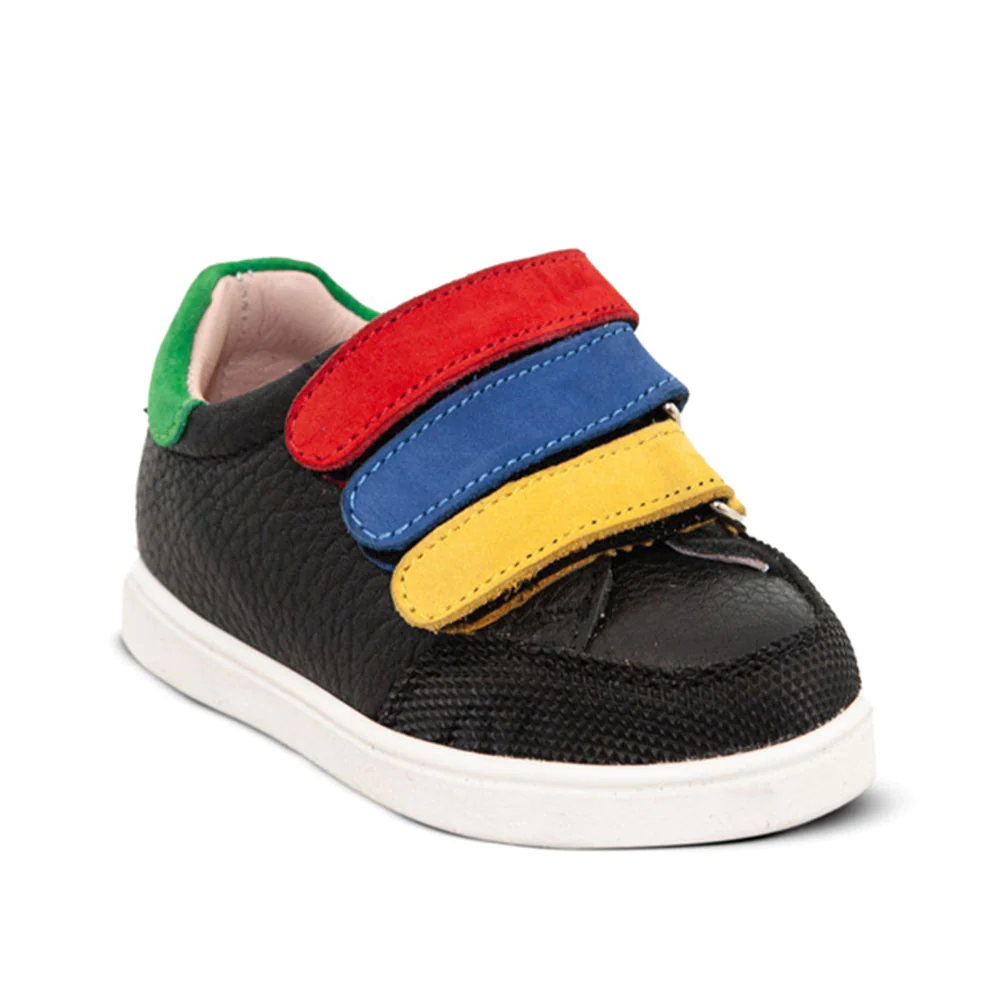 A child's black sneaker with colorful straps