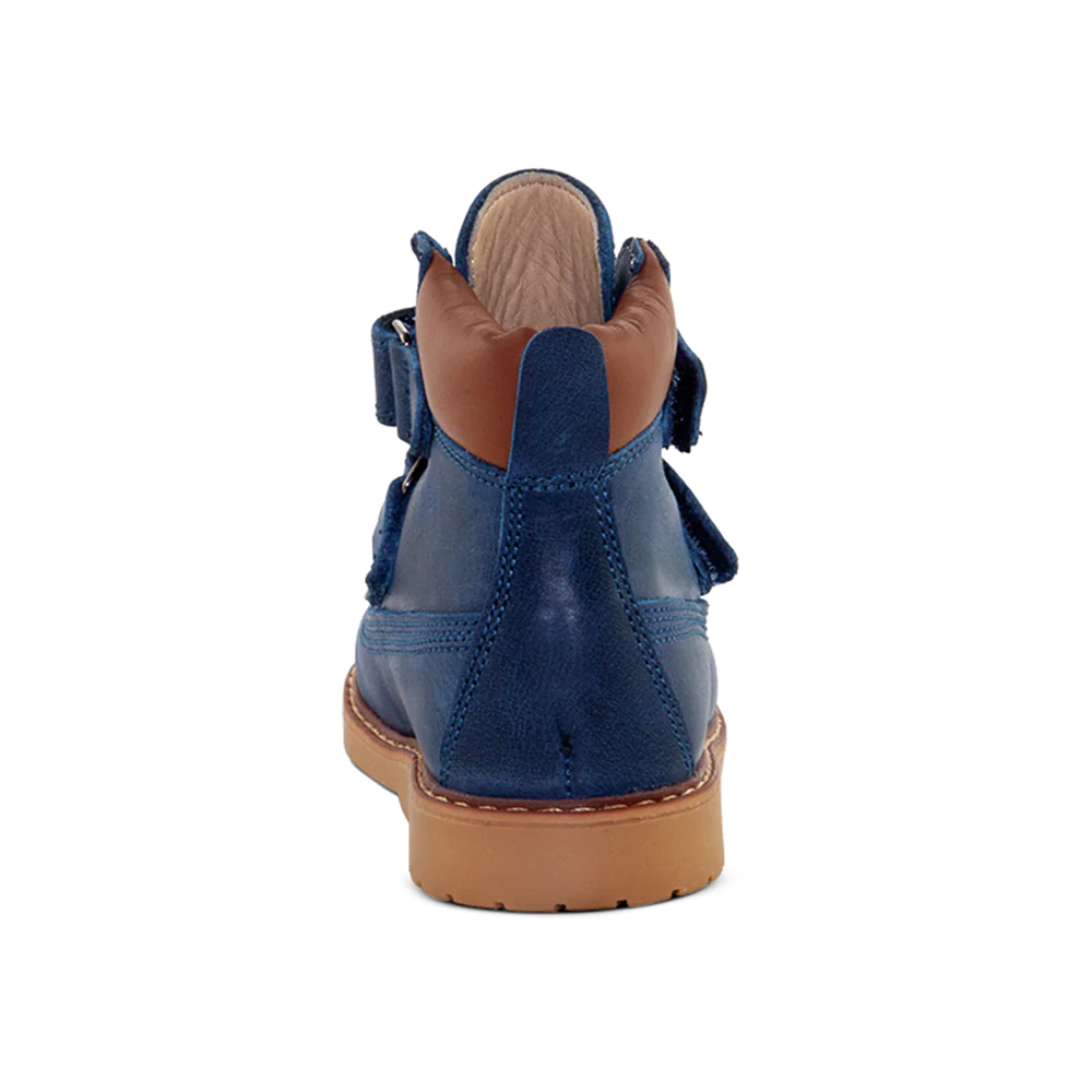 A rear view of a blue child's boot
