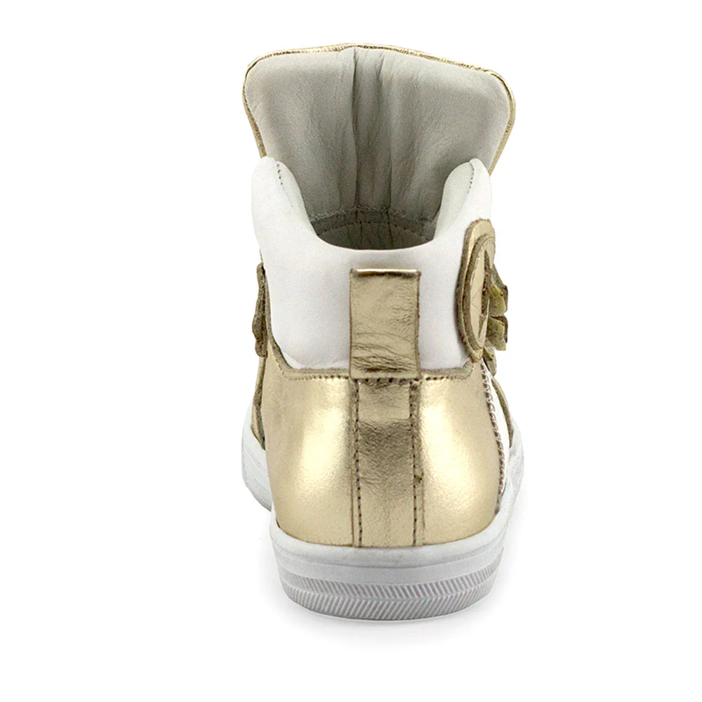 a gold and white high top sneaker
