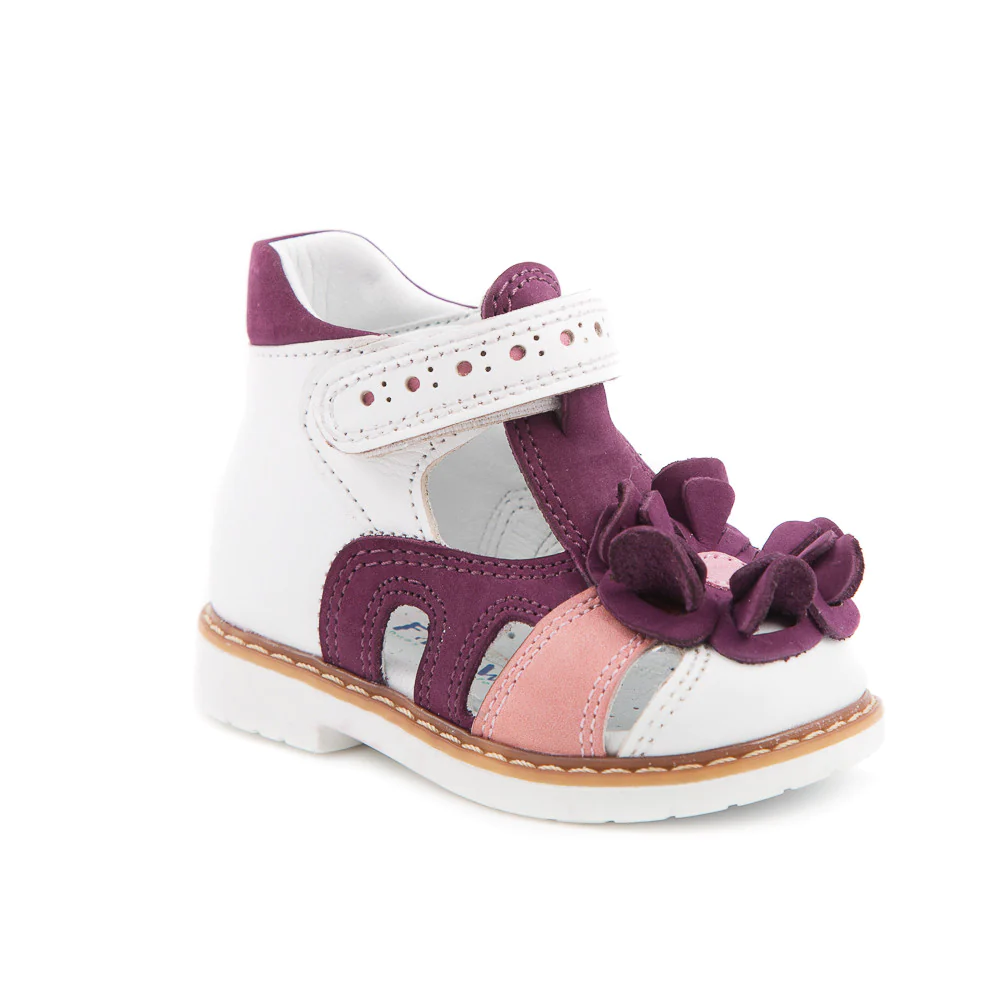 A white and purple kids' sandal with a flower on the side