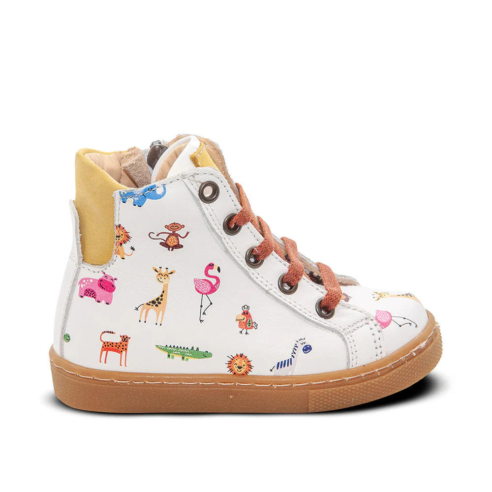 a child's white high top sneaker with animals on it