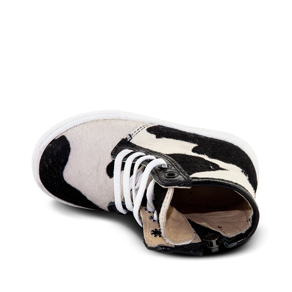 a pair of black and white shoes with white laces