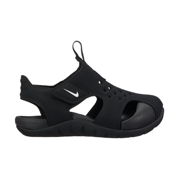 A black nike sandal with a white nike logo.