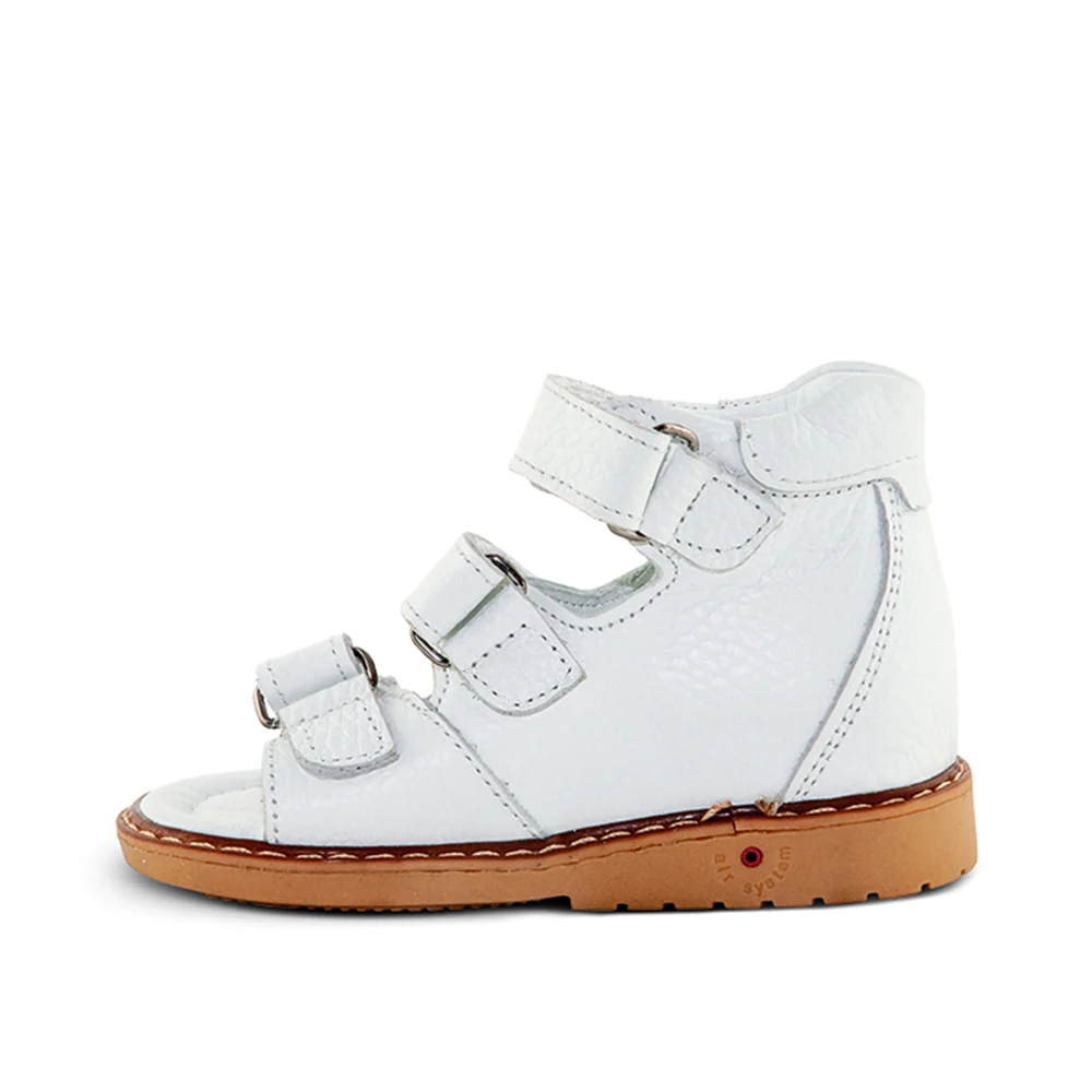 A white kids' shoe with two straps and a wooden sole