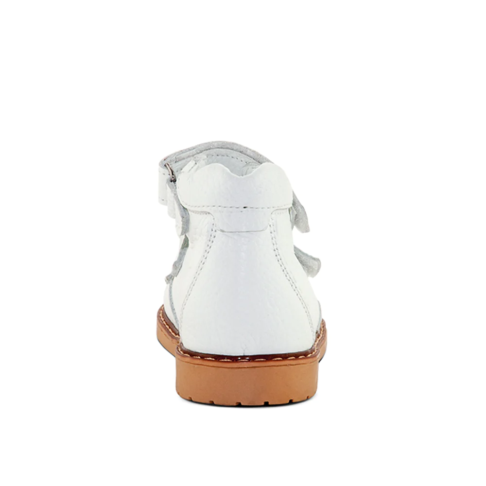 A white kids' sandal with a brown sole