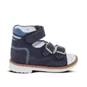 a blue shoe with a white sole and a blue strap