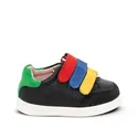 A child's black sneaker with multi-coloured straps