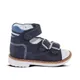 a blue shoe with a white sole and a blue strap