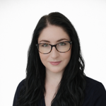 a woman with long black hair wearing glasses