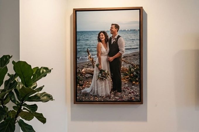 A framed canvas wedding portrait.