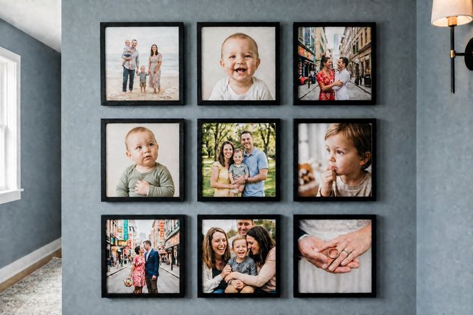 a wall with a bunch of pictures hanging on it
