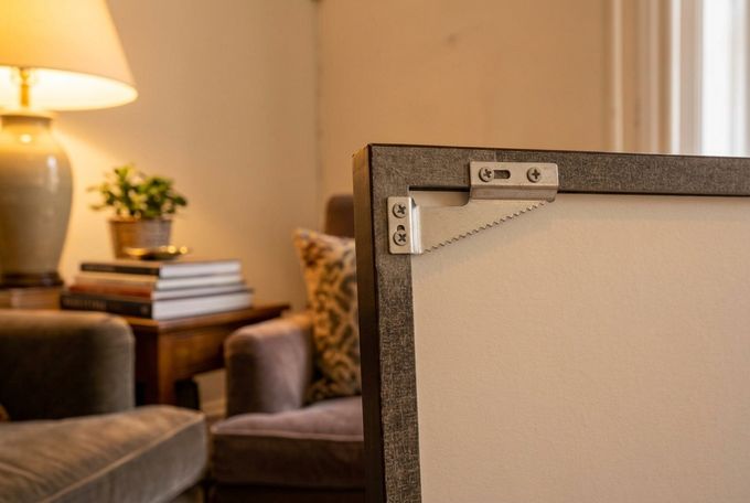 a corner sawtooth hanger on a picture frame living room