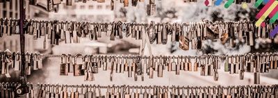 a bunch of keys hanging on a wall