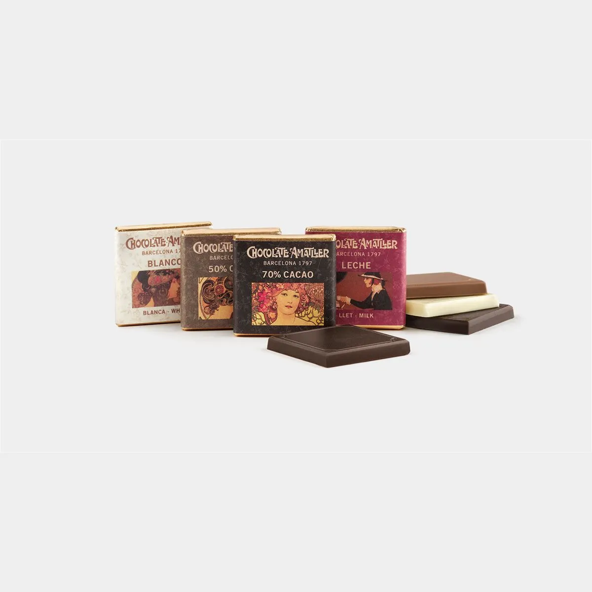 A group of chocolate Neapolitans sitting next to each other.