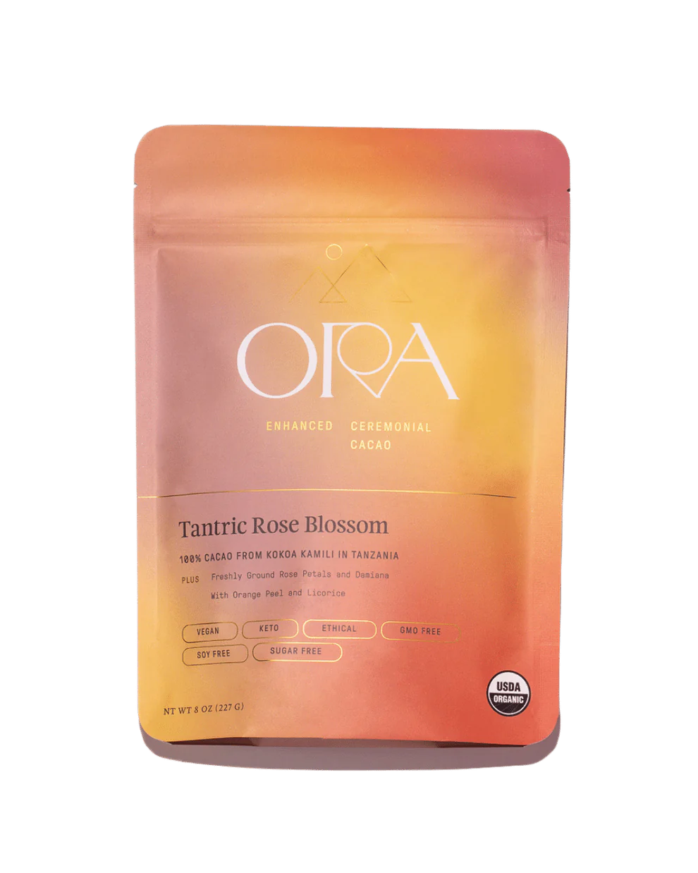 Ora tantic rose blossom Cacao in a yellow, peach and purple packet.