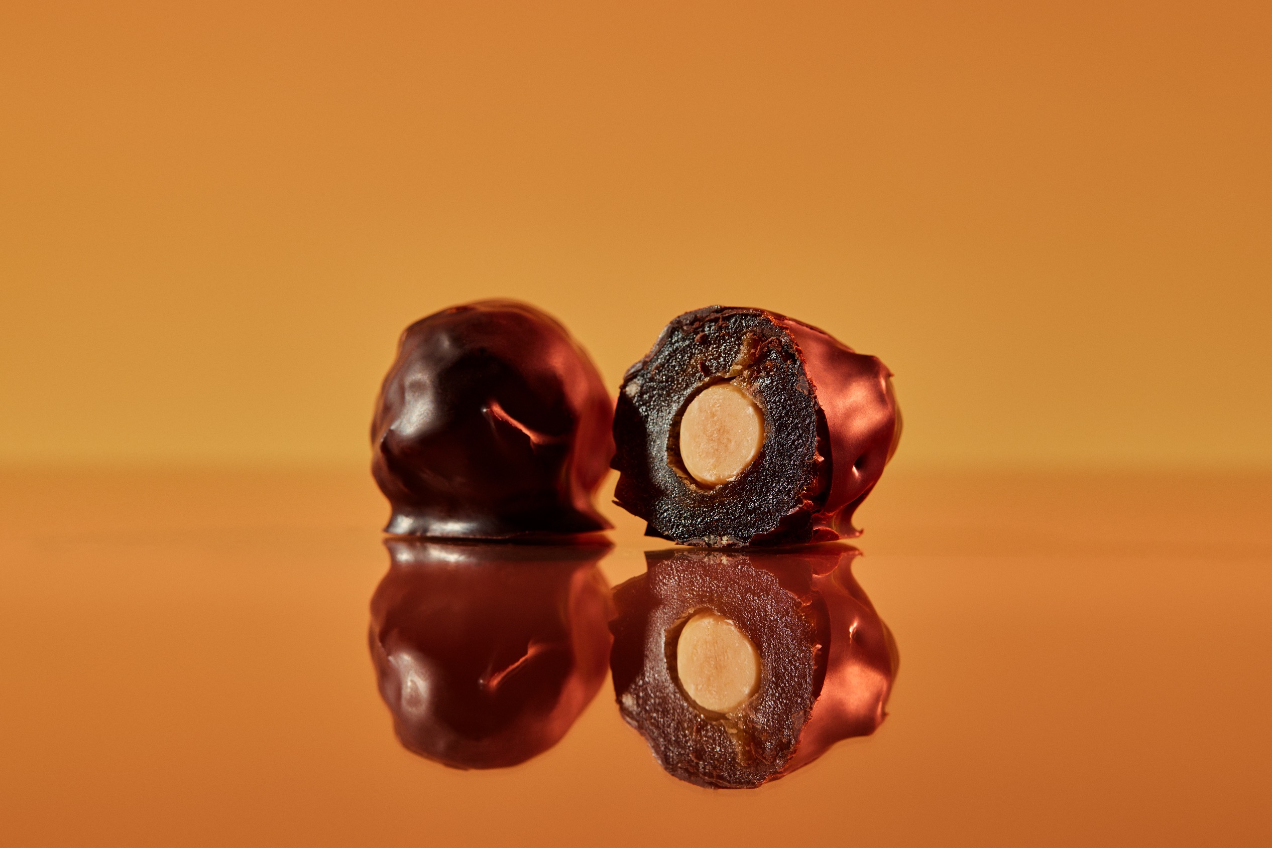 Medjool dates covered chocolate filled with hazelnuts 