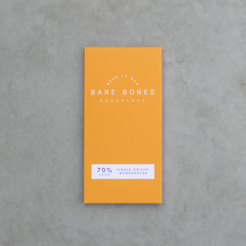 A slab of Bare Bones chocolate on a table.