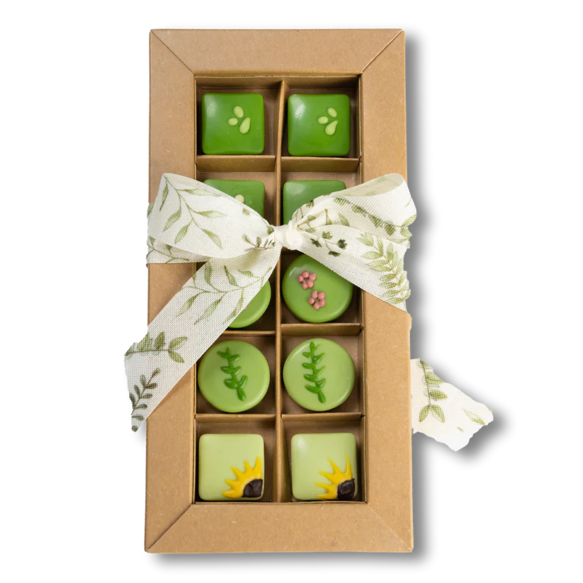 A box of green chocolates with a bow. 10 chocolates filled with various flavors.