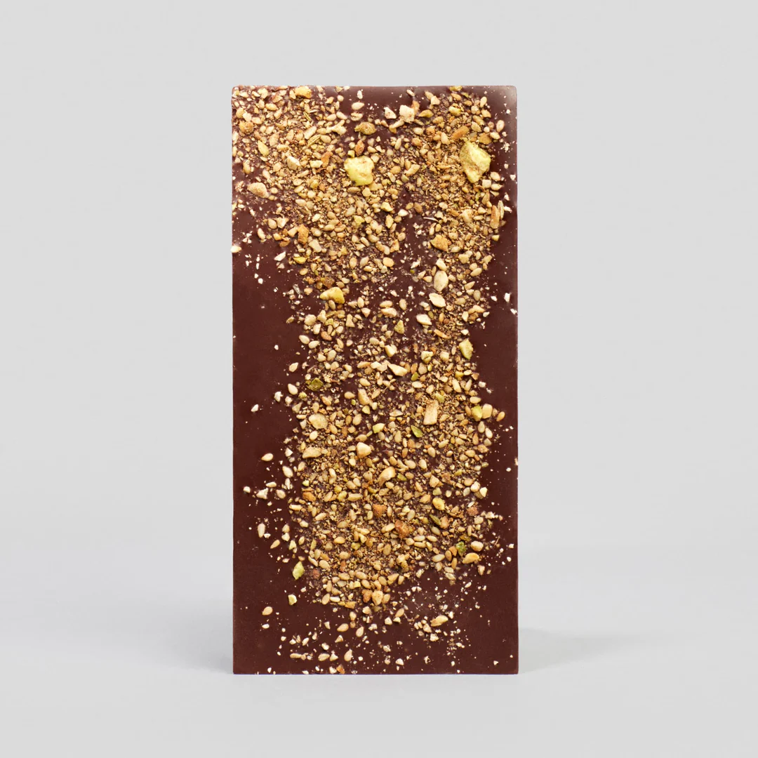 A slab of Kaicao 75% Dark Chocolate with Dukkah.
